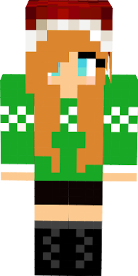 Green holiday sweater with amber hair and black boots