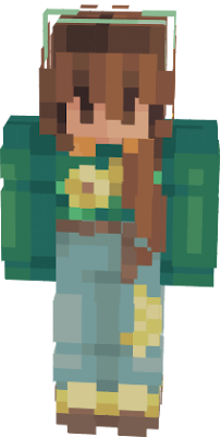 A girl wearing a green sweater, jeans and brown shoes. She has brown hair with sunflowers.