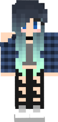 This is a girl with blue ombre hair. She is wearing a blue flannel shirt with a gray crop top.