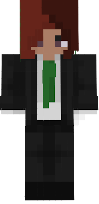 felix in a suit with a green tie, duh
